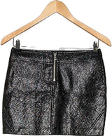 La garantie Once Again : 567125 vêtements d'occasion de marque en état irréprochable.