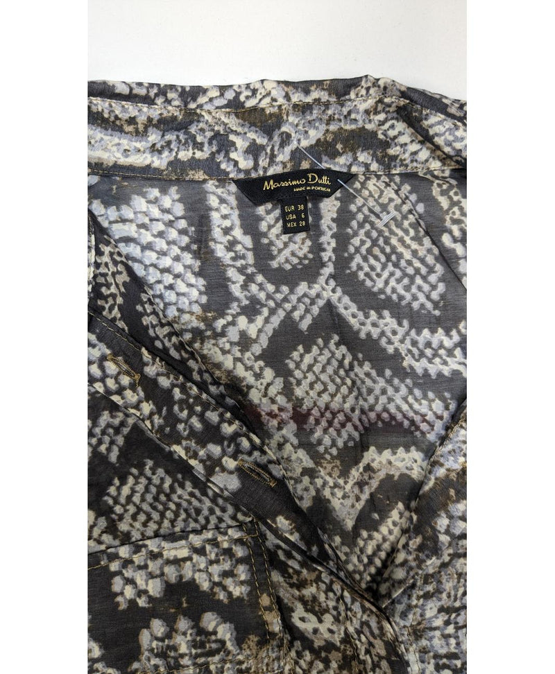 567159 Once Again, la référence de la friperie en ligne pour des achats de vêtements d'occasion sans souci et en état parfait.