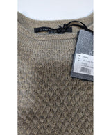 La garantie Once Again : 567205 vêtements d'occasion de marque en état irréprochable.