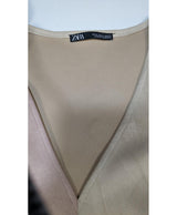 La garantie Once Again : 567229 vêtements d'occasion de marque en état irréprochable.