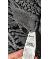 La garantie Once Again : 567661 vêtements d'occasion de marque en état irréprochable.