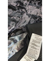 Élégance responsable avec cette pièce vintage 567799 en parfait état, sélectionnée par Once Again.