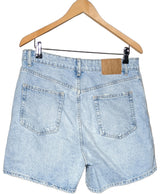 La garantie Once Again : 567872 vêtements d'occasion de marque en état irréprochable.