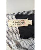 La garantie Once Again : 568178 vêtements d'occasion de marque en état irréprochable.