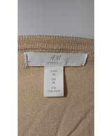 La garantie Once Again : 568229 vêtements d'occasion de marque en état irréprochable.
