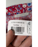 La garantie Once Again : 568339 vêtements d'occasion de marque en état irréprochable.