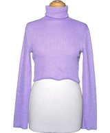 La garantie Once Again : 568368 vêtements d'occasion de marque en état irréprochable.