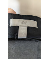La garantie Once Again : 568405 vêtements d'occasion de marque en état irréprochable.