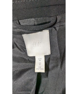 La garantie Once Again : 568493 vêtements d'occasion de marque en état irréprochable.