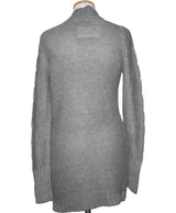 La garantie Once Again : 568607 vêtements d'occasion de marque en état irréprochable.