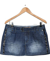La garantie Once Again : 568839 vêtements d'occasion de marque en état irréprochable.