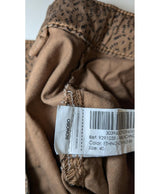 La garantie Once Again : 568984 vêtements d'occasion de marque en état irréprochable.