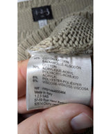 La garantie Once Again : 569120 vêtements d'occasion de marque en état irréprochable.