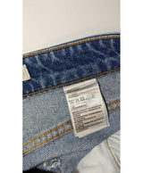 La garantie Once Again : 569149 vêtements d'occasion de marque en état irréprochable.