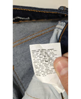 La garantie Once Again : 569150 vêtements d'occasion de marque en état irréprochable.