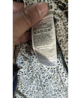 La garantie Once Again : 569176 vêtements d'occasion de marque en état irréprochable.
