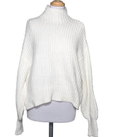 La garantie Once Again : 569312 vêtements d'occasion de marque en état irréprochable.