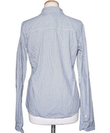 La garantie Once Again : 569334 vêtements d'occasion de marque en état irréprochable.