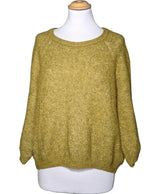 La garantie Once Again : 569510 vêtements d'occasion de marque en état irréprochable.