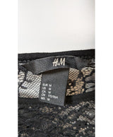 569542 Once Again, la référence de la friperie en ligne pour des achats de vêtements d'occasion sans souci et en état parfait.