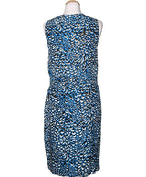La garantie Once Again : 569554 vêtements d'occasion de marque en état irréprochable.