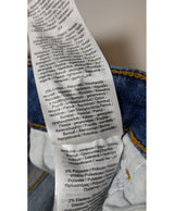 La garantie Once Again : 569590 vêtements d'occasion de marque en état irréprochable.