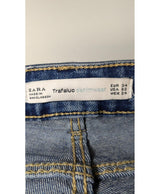 La garantie Once Again : 569663 vêtements d'occasion de marque en état irréprochable.