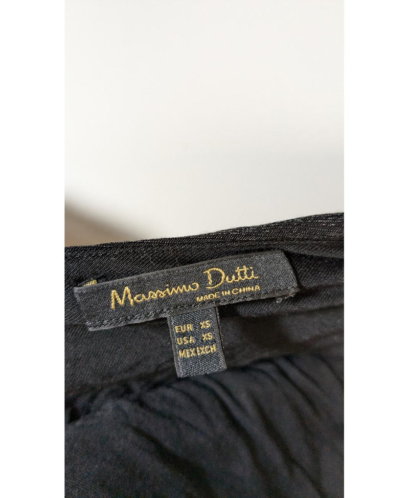 Élégance responsable avec cette pièce vintage 569711 en parfait état, sélectionnée par Once Again.