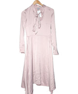 La garantie Once Again : 569756 vêtements d'occasion de marque en état irréprochable.