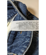 La garantie Once Again : 569812 vêtements d'occasion de marque en état irréprochable.