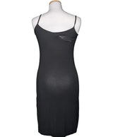 La garantie Once Again : 569825 vêtements d'occasion de marque en état irréprochable.