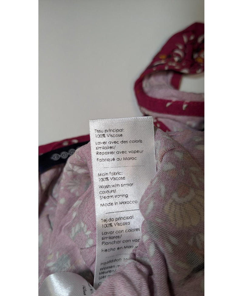 La garantie Once Again : 570288 vêtements d'occasion de marque en état irréprochable.