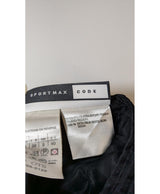 La garantie Once Again : 570360 vêtements d'occasion de marque en état irréprochable.