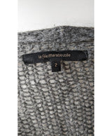 La garantie Once Again : 570497 vêtements d'occasion de marque en état irréprochable.