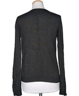 La garantie Once Again : 570499 vêtements d'occasion de marque en état irréprochable.
