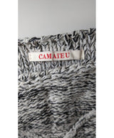 La garantie Once Again : 570581 vêtements d'occasion de marque en état irréprochable.