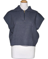 La garantie Once Again : 570584 vêtements d'occasion de marque en état irréprochable.