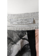 La garantie Once Again : 570652 vêtements d'occasion de marque en état irréprochable.