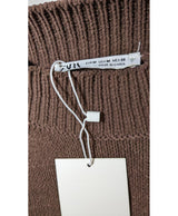 La garantie Once Again : 570666 vêtements d'occasion de marque en état irréprochable.