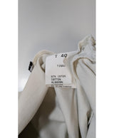 La garantie Once Again : 570987 vêtements d'occasion de marque en état irréprochable.