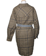 La garantie Once Again : 571105 vêtements d'occasion de marque en état irréprochable.