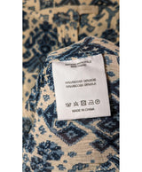 La garantie Once Again : 571302 vêtements d'occasion de marque en état irréprochable.