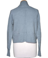 La garantie Once Again : 571307 vêtements d'occasion de marque en état irréprochable.