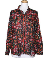 La garantie Once Again : 571327 vêtements d'occasion de marque en état irréprochable.