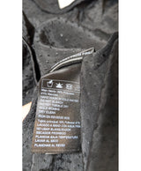 La garantie Once Again : 571550 vêtements d'occasion de marque en état irréprochable.