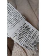 La garantie Once Again : 571624 vêtements d'occasion de marque en état irréprochable.