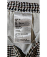 La garantie Once Again : 571654 vêtements d'occasion de marque en état irréprochable.