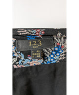 La garantie Once Again : 571664 vêtements d'occasion de marque en état irréprochable.