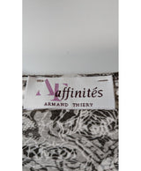 La garantie Once Again : 571700 vêtements d'occasion de marque en état irréprochable.