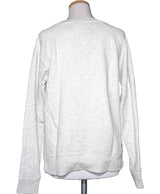 La garantie Once Again : 571867 vêtements d'occasion de marque en état irréprochable.